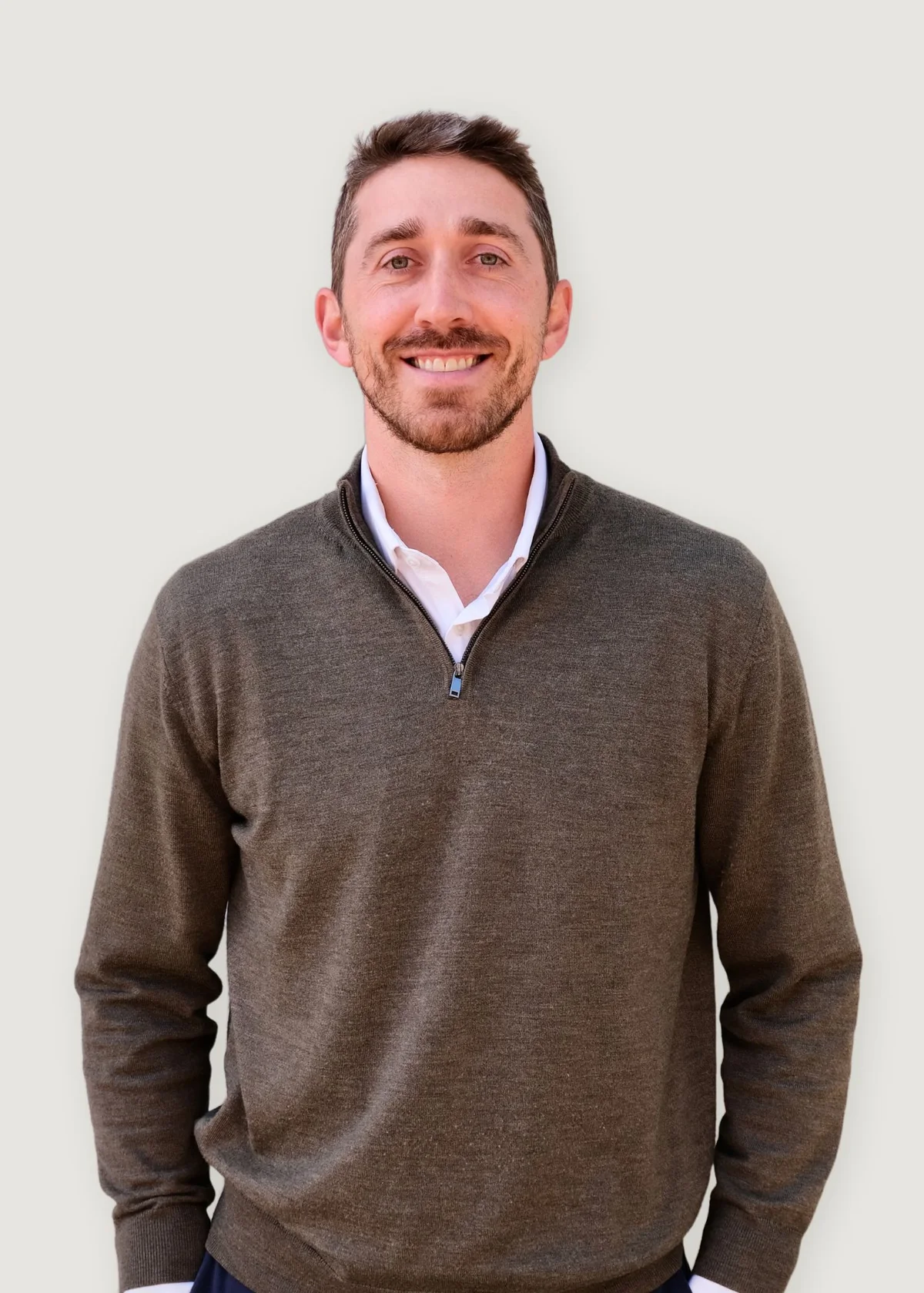 Luke MacDougall, founder of MacDougall Builders, in a studio portrait